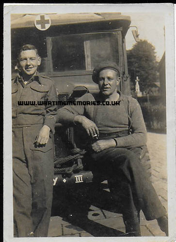 Dave Wells R.A.M.C. on left, May 1944 in UK with K2 Austin, ambulance driver on right name unknown.